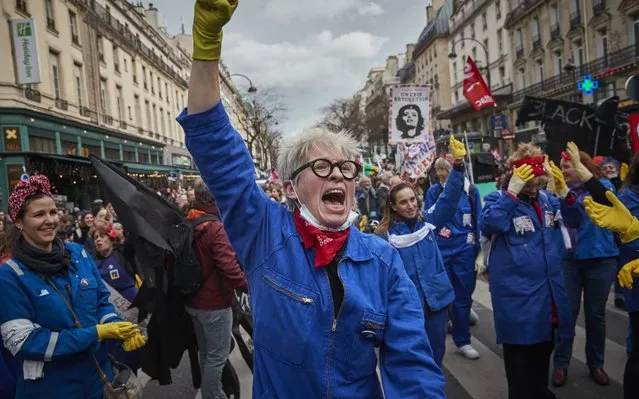 Protestors dressed as the icon Rosie the Riveter chant in protest to the French Government's pension reform bill during demonstrations in response to French Prime Minister Edouard Philippe enacting article 49.3 of the constitution to force through the pension reform bill in the National Assembly on March 03, 2020 in Paris, France. The bill merges 42 different pension schemes into a single, points-based system, to have everyone in France retire at the same time, and is largely opposed by French Unions and follows months of strikes and protests. (Photo by Kiran Ridley/Getty Images)