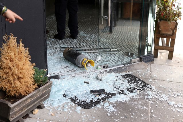 A vandalised Kosher restaurant is seen near a bridge with “Free Palestine” painted on it, in Golders Green in London, Britain on October 9, 2023. (Photo by Anna Gordon/Reuters)