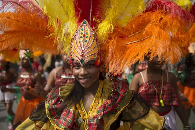 Performers participate in the children's day parade at the Notting Hill Carnival in London August 24, 2014. (Photo by Neil Hall/Reuters)
