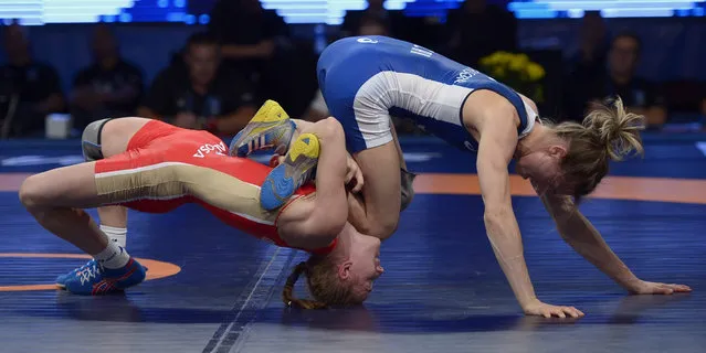 Genevieve Morrison Haley of Canada (BLUE) in action against Valentina Ivanovna Islamova Brik of Russia (RED) in their Women's Freestyle 48 kg bronze medal match at the Wrestling World Championships in Las Vegas, Nevada, USA, 09 September 2015. Morrison Haley  won the match and the bronze medal. (Photo by Paul Buck/EPA)