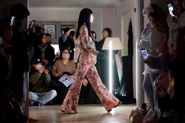 A model presents a creation from the 2025 Autumn/Winter collection by Japanese designer Lim Asafuji for the label “Pays des Fees” during Tokyo Fashion Week in Tokyo, Japan, 19 March 2025. The presentation of the 2025 Autumn/Winter collections runs from 17 to 22 March 2025. (Photo by Franck Robichon/EPA/EFE)