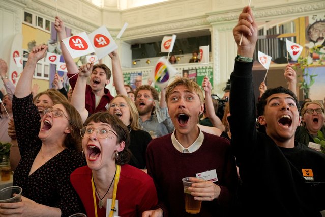 Attendees react to the exit poll during an election party of the Socialist People's Party during the European Parliament elections at Christiansborg in Copenhagen, Denmark, on June 9, 2024. (Photo by Bo Amstrup/Ritzau Scanpix via Reuters)