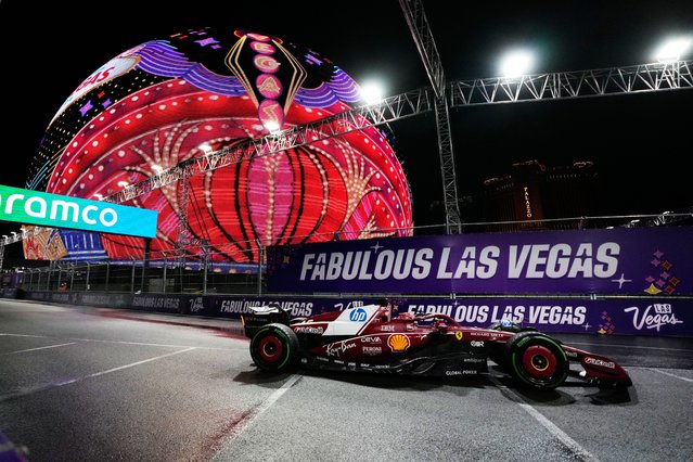 Ferrari driver Charles Leclerc of Monaco drives during a qualifying session at the Formula One Las Vegas Grand Prix auto race, Friday, November 21, 2025 in Las Vegas. (Photo by Eric Gay/AP Photo)