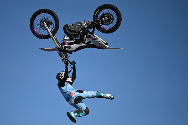 Riders perform during a freestyle show during EICMA, the Milan Motorcycle Show Milan, Italy on November 6, 2025 (Photo by Piero Cruciatti/Anadolu via Getty Images)
