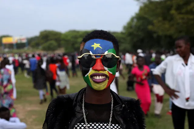 A South Sudanese girl with the national flag painted on her face poses for a portrait at the Nyakuron Cultural Center in Juba, South Sudan July 9, 2018. (Photo by Andreea Campeanu/Reuters)