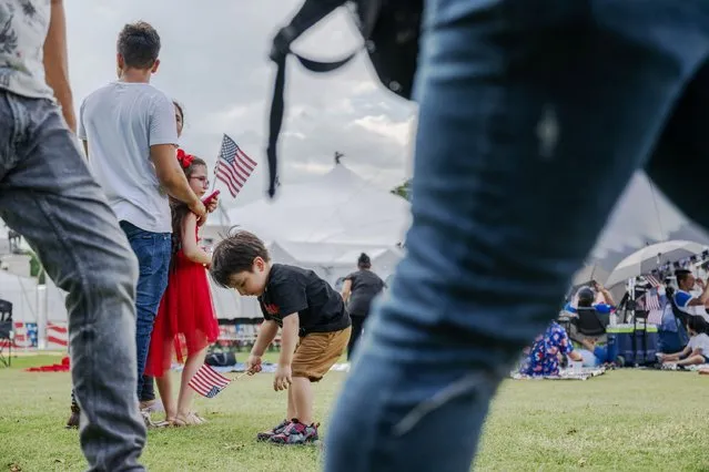 Families gather on the West Lawn of the US Capitol for A Capital Fourth in Washington, DC on Independence Day, July 04, 2023. (Photo by Craig Hudson for The Washington Post)