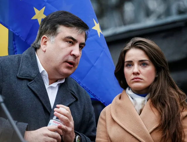 Former Georgian President and former governor of Odessa region Mikheil Saakashvili (L) and Yulia Marushevska, former head of the customs office at the Black Sea port of Odessa, attend an anti-government rally in central Kiev, Ukraine, November 27, 2016. (Photo by Gleb Garanich/Reuters)
