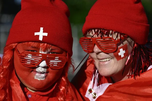 Swiss supporters pose for a photo ahead of the Women's World Cup second round soccer match between Switzerland and Spain at Eden Park in Auckland, New Zealand, Saturday, August 5, 2023. (Photo by Andrew Cornaga/AP Photo)
