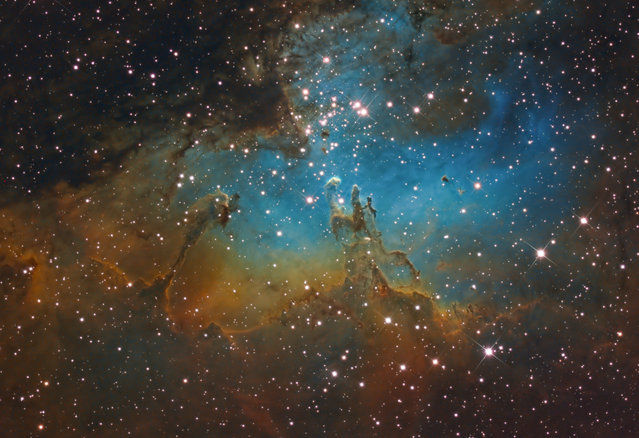 M16 is in the constellation Serpens. This is approximately 7000 light years from earth. There is a young star cluster surrounded by a emission nebula composed of interstellar dust. The cluster is referred to as NGC6611. This is a very active star forming region. (Bill Snyder)