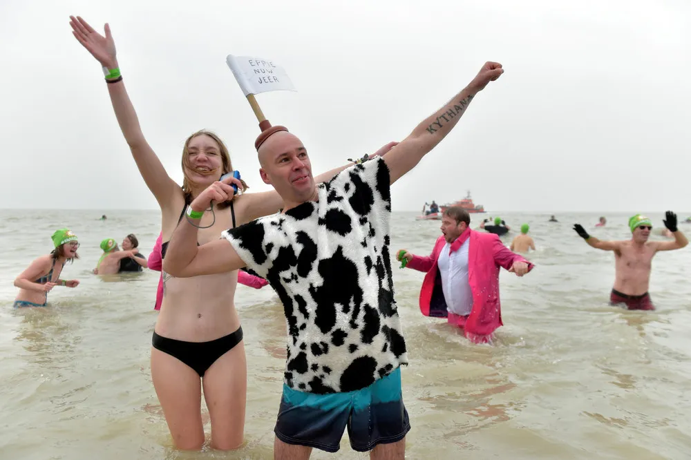 Swimmers Start New Year with Icy Plunges