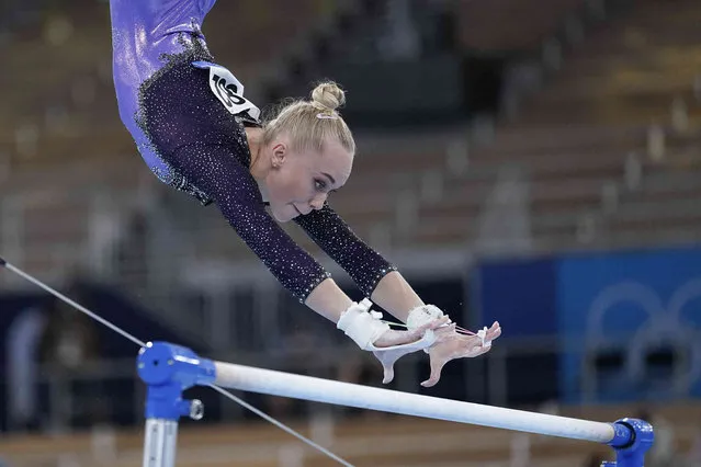 Angelina Melnikova of the Russian Olympic Committee, performs on the uneven bars during the artistic gymnastics women's apparatus final at the 2020 Summer Olympics, Sunday, August 1, 2021, in Tokyo, Japan. (Photo by Ashley Landis/AP Photo)