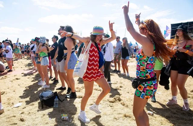 Festival-goers dancing during Boardmasters Festival 2021 at Watergate Bay on August 14, 2021 in Newquay, United Kingdom. (Photo by Jonny Weeks/Getty Images)