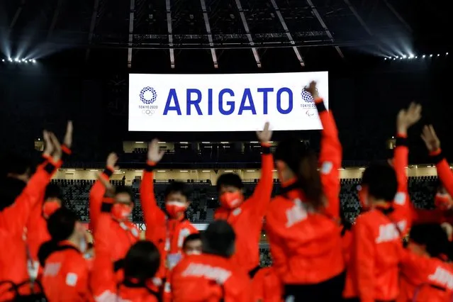 A monitor shows a word ARIGATO which means thak you during the closing ceremony at the Tokyo Paralympic Games in Tokyo on September 5, 2021. (Photo by Issei Kato/Reuters)