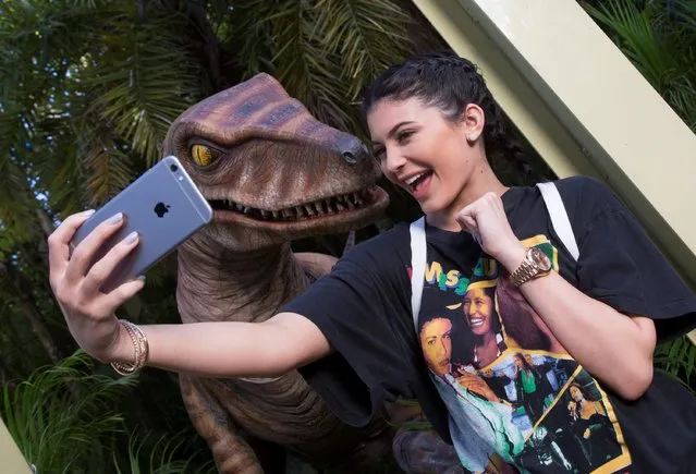 Kylie Jenner received a special welcome upon her arrival to Universal Orlando Resort, where she was hosted on March 9, 2016 in Orlando, Florida. The star snapped a selfie with a ferocious Velociraptor at the Raptor Encounter experience at Universals Islands of Adventure, followed by a day in the parks. Jenner is a reality television personality who just launched her very own beauty line, Kylie Cosmetics. (Photo by Universal Orlando via Getty Images)