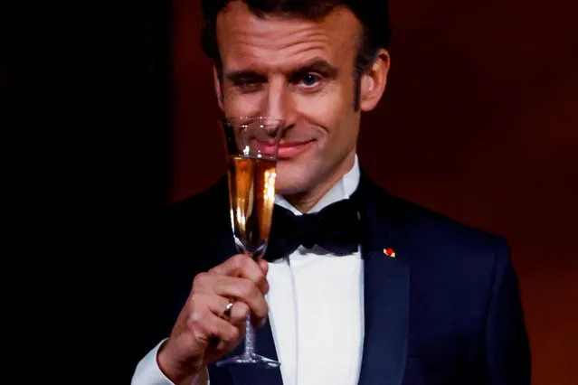 France's President Emmanuel Macron makes a toast, as the Bidens host the Macrons for a State Dinner at the White House, in Washington, U.S., December 1, 2022. (Photo by Evelyn Hockstein/Reuters)