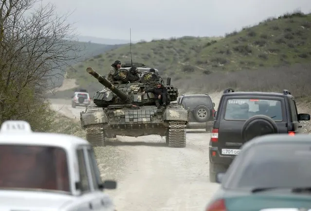 A tank of the self-defense army of Nagorno-Karabakh moves on the road near the village of Mataghis April 6, 2016. (Photo by Reuters/Staff)