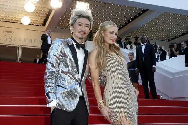 Socialite Paris Hilton (R) and a guest pose on the red carpet as they arrive for the screening of the animated film “Inside Out” (Vice Versa) out of competition at the 68th Cannes Film Festival in Cannes, southern France, May 18, 2015. (Photo by Benoit Tessier/Reuters)