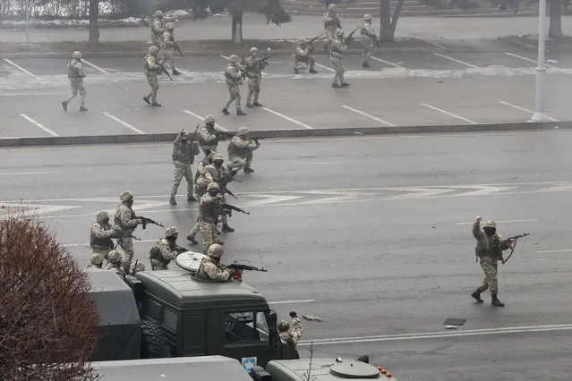 Security forces are used in a counterterrorism operation to stop mass unrest in Almaty, Kazakhstan on January 6, 2022. Protests were sparked by rising fuel prices in the towns of Zhanaozen and Aktau in western Kazakhstan on 2 January and spread rapidly across the country. Following a meeting between a government commission and protesters, the price for liquefied petroleum gas went down from $0.27 to $0.11. On 5 January, President Tokayev dismissed the cabinet and declared a 2 week state of emergency in the Mangistau and Almaty regions, as well as in the cities of Almaty and Nur-Sultan. (Photo by Valery Sharifulin/TASS)