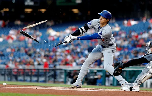 Los Angeles Dodgers designated hitter Shohei Ohtani (17) shatters his bat while hitting a ground ball against the Washington Nationals during the first inning at Nationals Park in Washington, District of Columbia on April 23, 2024. (Photo by Geoff Burke/USA TODAY Sports)