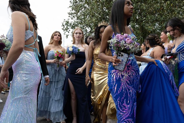 Seniors from Marietta high school class of 2024 gather at Brumby Hall historic site for a group photo before the school’s prom on Saturday, April 27, 2024 in Georgia, US. (Photo by Robin Rayne/ZUMA Press Wire/Rex Features/Shutterstock)