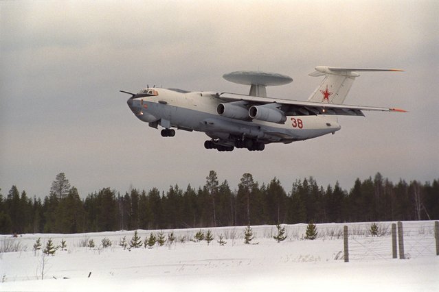 Russian A-50 military reconnaissance aircraft with special external radar and monitoring system takes off from the airport outside the town of Pechora, Komi repuplic, Russia, 29 March 1995. This airport is a part of the “Darial” space defence center responsible for North-Western air space territories, that encompass the Greenland sea, North Atlantic and the United States of America and can detect missiles within radius of 6,000 kilometres. (Photo by Vladimir Mashatin/EPA)