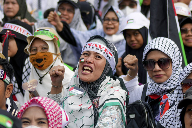 Protesters shout slogans during a rally in support of the Palestinians in Gaza in Jakarta, Indonesia, Sunday, June 9, 2024. (Photo by Tatan Syuflana/AP Photo)