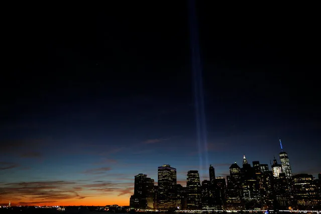 The Tribute in Light shines on the 15th anniversary of the 9/11 attacks in Manhattan, New York, U.S., September 11, 2016. (Photo by Andrew Kelly/Reuters)