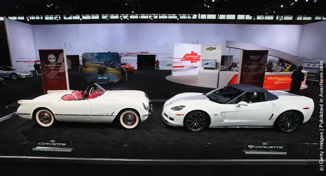 A 1953 Chevrolet Corvette sit nose to nose with a 60th anniversary 2013 Corvette 427 Convertible Collectors Edition during the media preview of the Chicago Auto Show