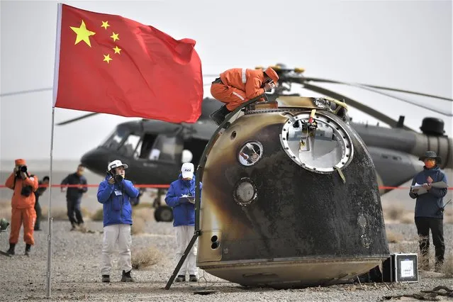 In this photo released by China's Xinhua News Agency, the return capsule of the Shenzhou-13 manned space mission is seen after landing at the Dongfeng landing site in northern China's Inner Mongolia Autonomous Region, Saturday, April 16, 2022. Three Chinese astronauts returned to Earth on Saturday after six months aboard China's newest space station in the longest crewed mission to date for its ambitious space program. (Photo by Peng Yuan/Xinhua via AP Photo)