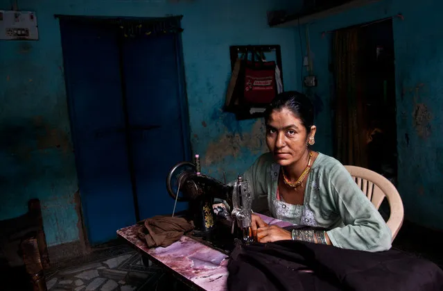 “Sewing”. This photo was taken in the village of Oceana city of Jodhpur Rajasthan region. Photo location: Central India. (Photo and caption by Osama Alsulami/National Geographic Photo Contest)