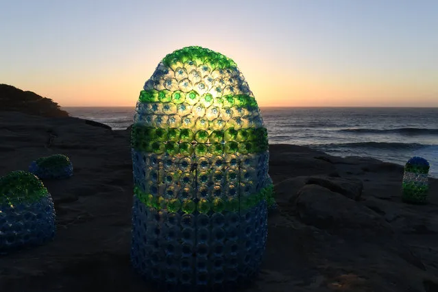 “Plastic Paradise” by Kathy Allam at Sculpture By The Sea at Bondi Beach on October 18, 2017 in Sydney, Australia. “By reusing and re-valuing discarded bottles I am exploring our own current dilemma of living with plastic. Can detritus be transformed into something joyous, sublime and beautiful?”. (Photo by Dean Lewins/AAP)
