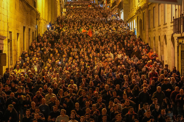 Demonstrators attend a protest by police professional associations demanding better salaries and work conditions in Lisbon, Wednesday, January 24, 2024. (Photo by Armando Franca/AP Photo)