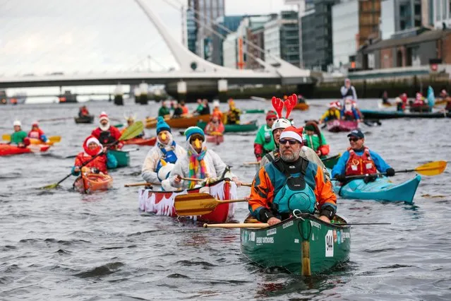 People take part in the ‘All In A Row Charity Liffey Challenge 2022’ in Dublin on December 3, 2022. The challenge aims to beat a 1,000km target in eight hours with forty skiffs, four Dragon Boats, kayaks, canoes and currachs all on the water to raise funds for RNLI Lifeboats and the Irish Underwater Search and Recovery Unit. (Photo by Tiberio Ventura for The Irish Times)