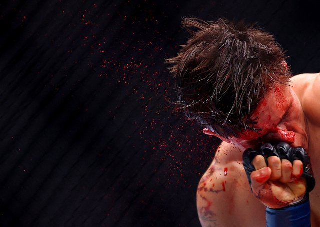 Lone'er Kavanagh is punched by Felipe dos Santos during their UFC bout in London on Saturday, March 22, 2025. Kavanagh won via decision. (Photo by Andrew Boyers/Action Images via Reuters)