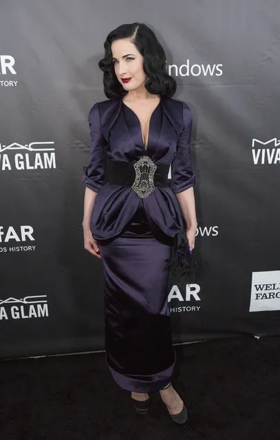 Burlesque dancer Dita Von Teese poses at amfAR's Fifth Annual Inspiration Gala in Los Angeles, California October 29, 2014. (Photo by Mario Anzuoni/Reuters)