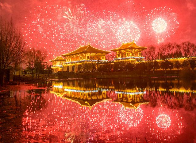 Fireworks explode over the Ancient Luoyang City of the Sui And Tang Dynasties to celebrate the Chinese Lunar New Year on February 10, 2024 in Luoyang, Henan Province of China. The Spring Festival, or the Chinese Lunar New Year, falls on February 10 this year. (Photo by Zhang Yixi/VCG via Getty Images)