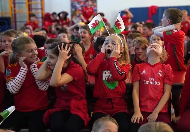 School children at Rhiwbeina Primary School, Cardiff, watch the FIFA World Cup Group B match between Wales and Iran on Friday, November 25, 2022. (Photo by Jacob King/PA Images via Getty Images)
