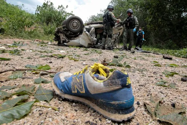 Military personnel inspect the site of a bomb attack at Krong Pinang District district in the troubled southern province of Yala, Thailand, September 23, 2016. (Photo by Surapan Boonthanom/Reuters)