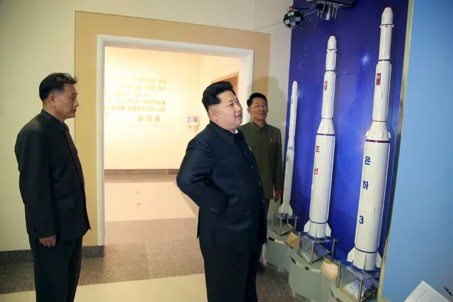 North Korean leader Kim Jong Un (C) provides field guidance at the newly built National Space Development General Satellite Control and Command Centre in this undated photo released by North Korea's Korean Central News Agency (KCNA) in Pyongyang May 3, 2015. (Photo by Reuters/KCNA)