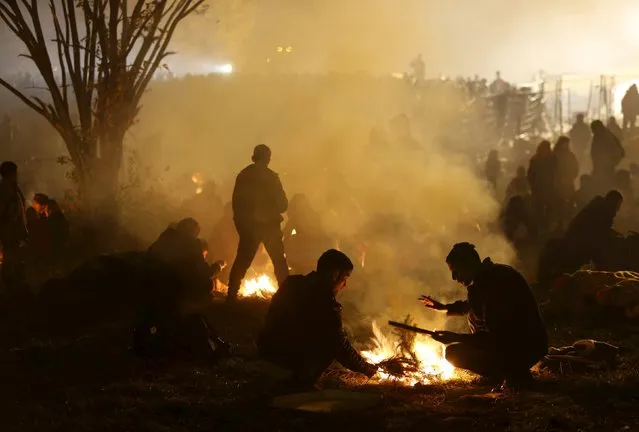 Migrants wait to cross the Slovenia-Austria border in Sentilj, Slovenia, October 27, 2015. (Photo by Srdjan Zivulovic/Reuters)