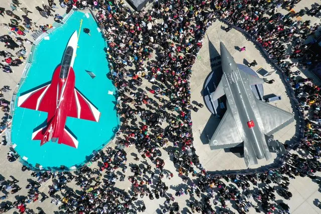 An aerial view of the people visiting the stands during the fourth day of the Turkiyeâs largest technology and aviation event TEKNOFEST at Istanbul's Ataturk Airport in Istanbul, Turkiye on April 30, 2023. (Photo by Ali Atmaca/Anadolu Agency via Getty Images)
