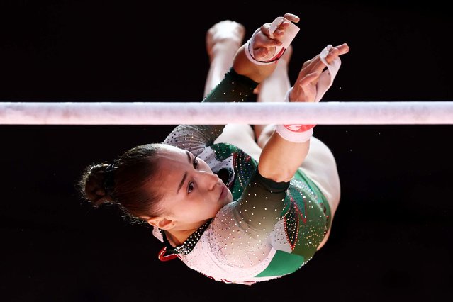 Algerian gymnast Kaylia Nemour competes on the uneven bars during the World Championships in Jakarta, Indonesia, on Friday, October 24, 2025. She won the event, making her the first gymnast from Africa to become a world champion. She also won the event at the Olympics last year. (Photo by Yong Teck Lim/Getty Images)