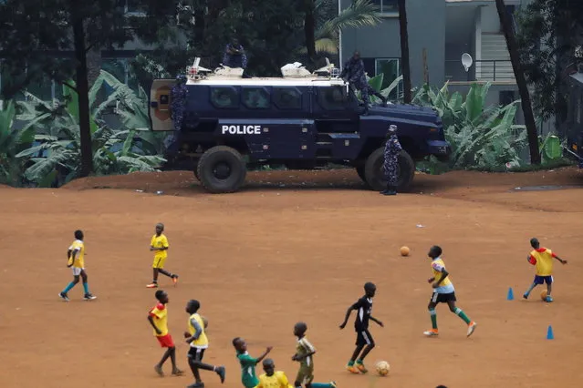 An Ugandan police APC (Armoured Personnel Carrier) is parked on a soccer field in Kampala, Uganda on January 18, 2021. (Photo by Baz Ratner/Reuters)