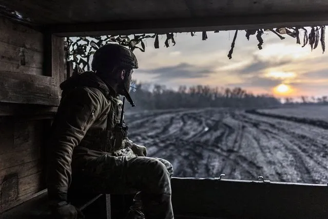 Ukrainian soldier of the Aidar battalion heading to an artillery position in Donetsk oblast, 4 April 2023. (Photo by Diego Herrera Carcedo/Anadolu Agency via Getty Images)