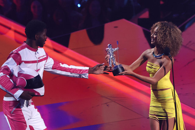 South African singer and songwriter Tyla accepts the award for Best Afrobeats for “Water” from presenter Lil Nas X during the 2024 MTV Video Music Awards in Elmont, New York, U.S., September 11, 2024. (Photo by Brendan McDermid/Reuters)