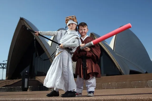 Fans pose at the Star Wars: The Force Awakens fan event at Sydney Opera House on December 10, 2015 in Sydney, Australia. (Photo by Brendon Thorne/Getty Images for Walt Disney Studios)