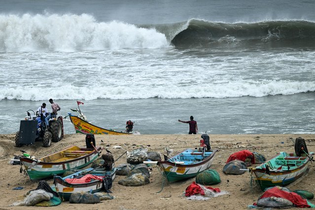 Fishing boats are moored to a safer area at the Marina beach as a preventive measure ahead of Cyclone Montha in Chennai, India on October 27, 2025. (Photo by R. Satish Babu/AFP Photo)