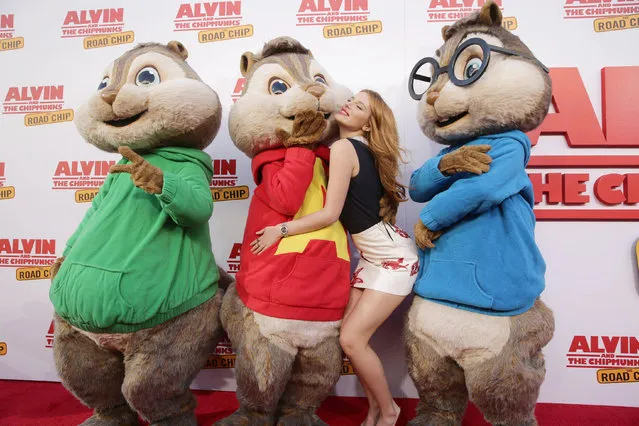 Bella Thorne and The Chipmunks seen at Twentieth Century Fox Friends and Family screening of “Alvin and The Chipmunks: The Road Trip” at Zanuck Theatre on Saturday, December 12, 2015, in Los Angeles, CA. (Photo by Eric Charbonneau/Invision for Twentieth Century Fox/AP Images)