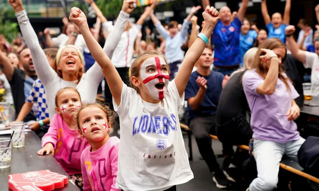 Young England fans celebrate their side's second goal of the game scored by England's Lauren Hemp, as they watch a screening of the FIFA Women's World Cup 2023 Group D match between England and China at BOXPARK Croydon, London on Tuesday, August 1, 2023. (Photo by Adam Davy/PA Images via Getty Images)