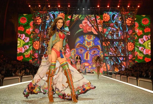 Gigi Hadid walks the runway during the 2016 Victoria's Secret Fashion Show on November 30, 2016 in Paris, France. (Photo by Dimitrios Kambouris/Getty Images for Victoria's Secret)
